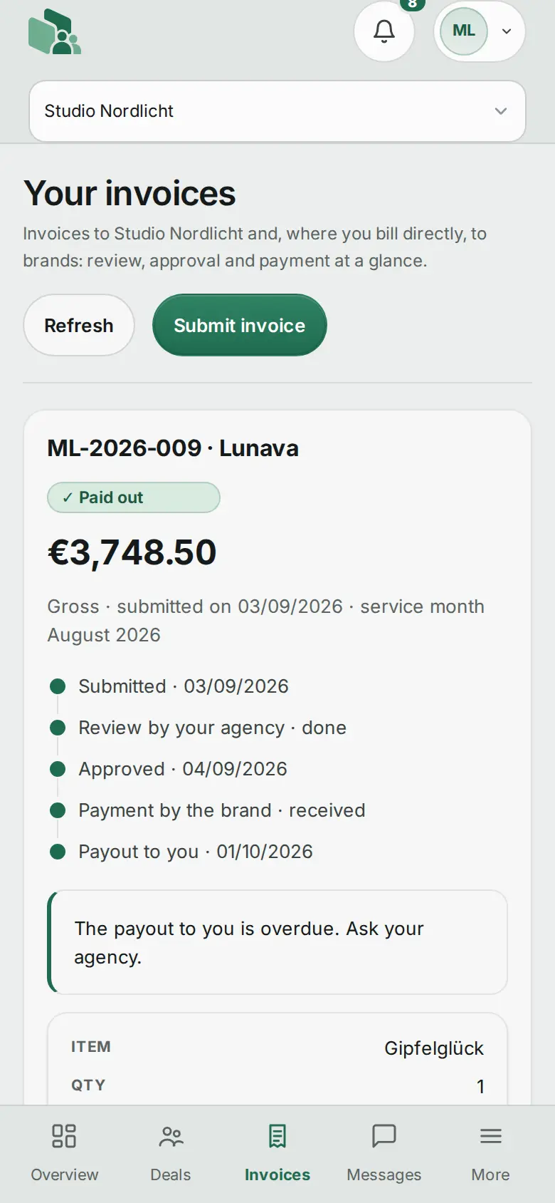 Creator portal on mobile: invoice with status “Paid out”.